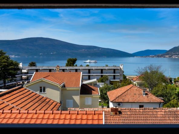 Luxurious two bedroom apartment with panoramic sea views in a very attractive location in Donja Lastva, only 2 minutes walk from the coast.